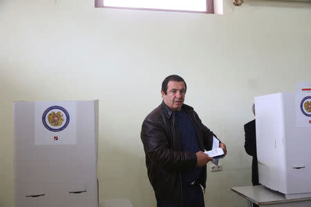 Businessman and opposition leader Gagik Tsarukyan votes during a parliamentary election at a poling station in Yerevan, Armenia, April 2, 2017. Varo Rafayelyan/PAN Photo/Handout via REUTERS