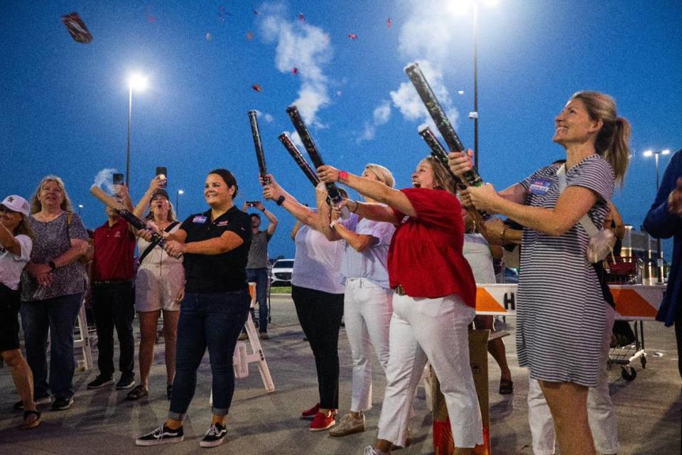 HEB staff shoot off fireworks during the grand opening of HEB on Wednesday, June 26 in Mansfield. The event organizers held a count down to open the doors to the public.