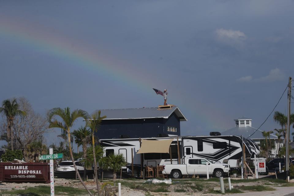 Rick Loughrey, right, a Fort Myers Beach resident and Hurricane Ian survivor ended his protest on Monday, August 7, 2023. Loughrey spent six days on the roof of his garage hoping to get answers regarding the fate of his garage with recent interpretations of FEMA regulations by the Town of Fort Myers Beach. The protest ended without answers.