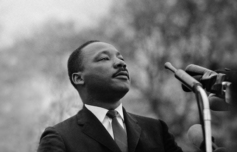 MONTGOMERY, AL - MARCH 25: Dr Martin Luther King Jr speaking before crowd of 25,000 Selma To Montgomery, Alabama civil rights marchers, in front of Montgomery, Alabama state capital building. On March 25, 1965 in Montgomery, Alabama.