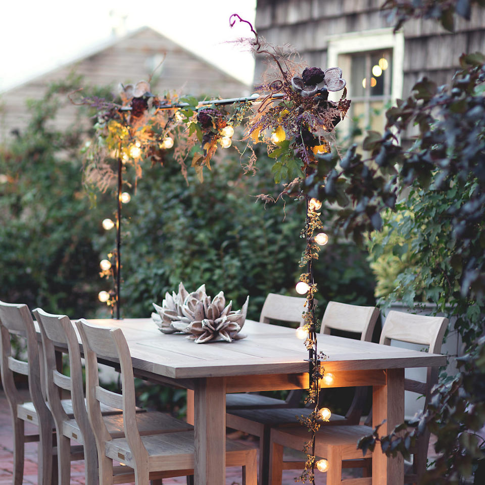 3. Frame your outdoor dining table in light