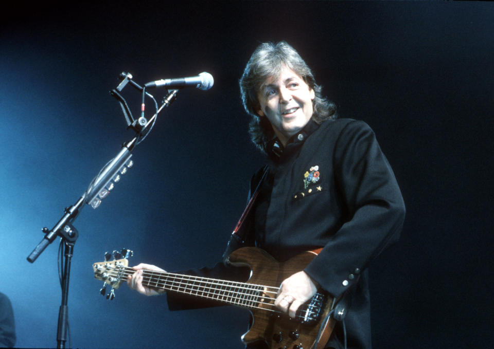 Paul McCartney performs live on stage at Wembley Arena on January 14 1990.