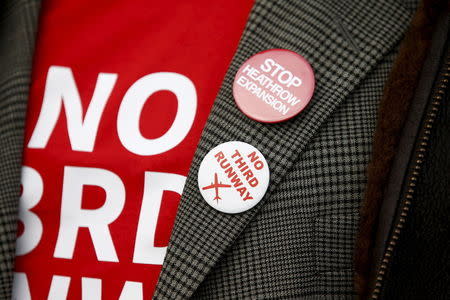 A protester takes part in a demonstration outside Heathrow Airport, west London, Britain November 26, 2015. REUTERS/Peter Nicholls