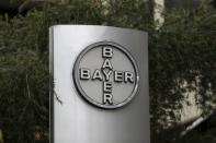 The corporate logo of Bayer is seen at the headquarters building in Caracas March 1, 2016. Picture taken March 1, 2016. REUTERS/Marco Bello