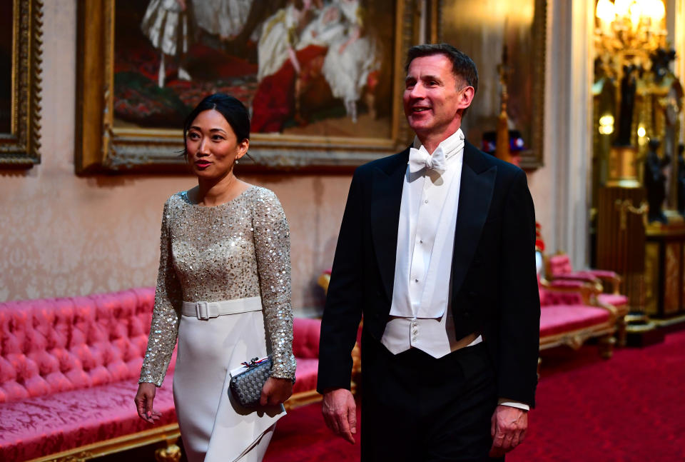 Mr Hunt and his wife Lucia at Buckingham Palace during the state visit of Donald Trump this month. (PA)