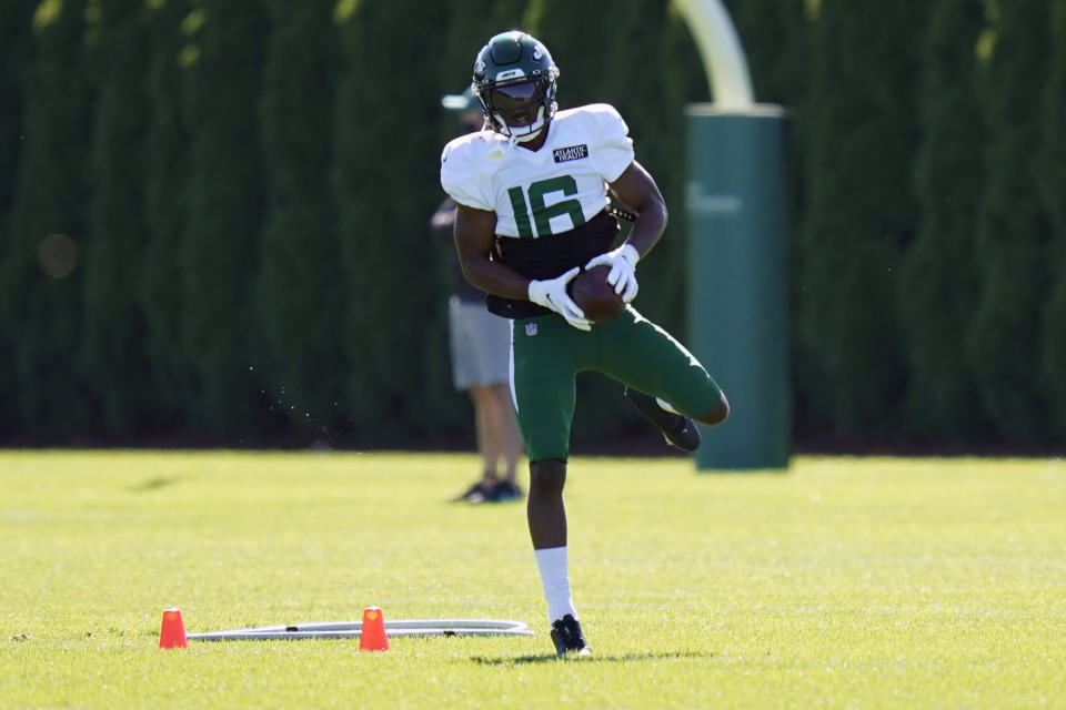 New York Jets' Jeff Smith makes a catch during practice at the NFL football team's training camp in Florham Park, N.J., Thursday, Aug. 20, 2020. Jeff Smith was a quarterback for as long as he can remember before a position switch to wide receiver in college. It turned out to be his unexpected path to the NFL. (AP Photo/Seth Wenig)