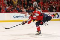 <p>Alex Ovechkin #8 of the Washington Capitals takes a shot during a NHL hockey game against the New Jersey Devils on December 26, 2009 at the Verizon Center in Washington, DC. (Photo by Mitchell Layton/NHLI via Getty Images) </p>