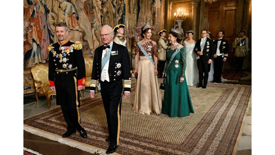 King Frederik X of Denmark and King Carl XVI Gustaf enter banquet