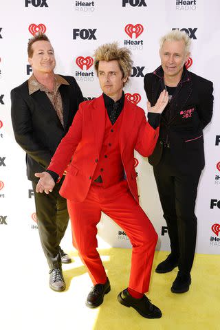 <p>Frazer Harrison/Getty</p> Tre Cool, Billie Joe Armstrong and Mike Dirnt of Green Day