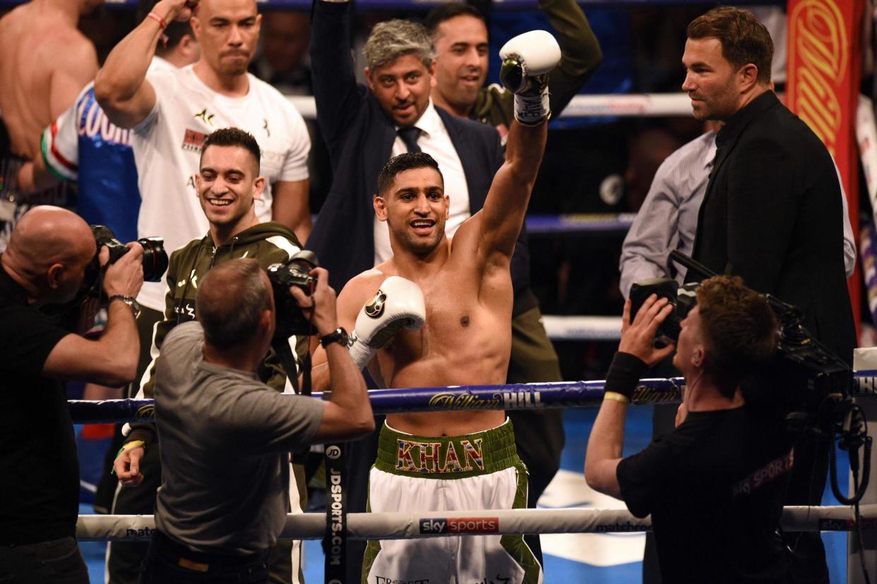 Blink and you'll miss it | Khan wins comeback fight in just 40 seconds: Oli Scarff/AFP/Getty Images