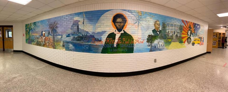 A section of the Robert Smalls mural at Robert Smalls International Academy taken as a panorama, which creates an illusion of a curve.