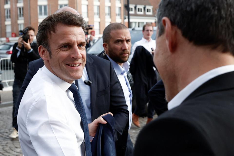 The French president arrives in Carvin on 11 April (REUTERS)