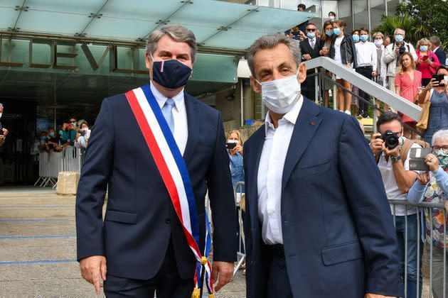 <p>Nicola Sarkozy et son ami et ex-conseiller Franck Louvier, samedi à La Baule. </p>