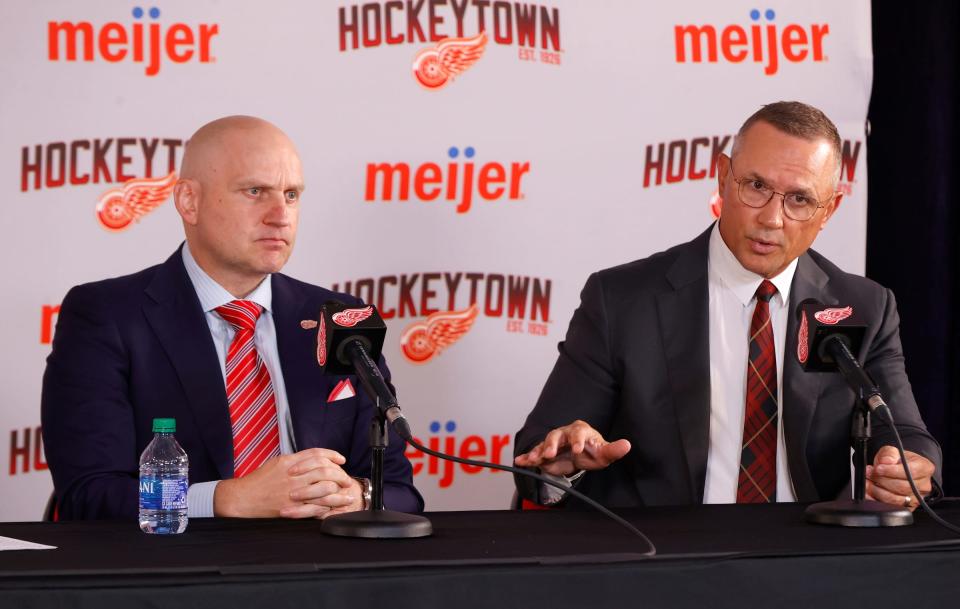 Detroit Red Wings GM Steve Yzerman, right, introduces new Wings coach Derek Lalonde at Little Caesars Arena in Detroit on Friday, July 1, 2022.