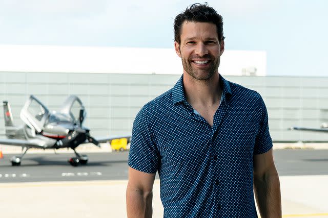 <p>Cirrus</p> Aaron O'Connell standing in front of his Cirrus SR22T (Turbo)