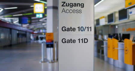 A sign is pictured during a warning strike by ground services, security inspection and check-in staff at Tegel airport in Berlin, Germany March 13, 2017. REUTERS/Hannibal Hanschke