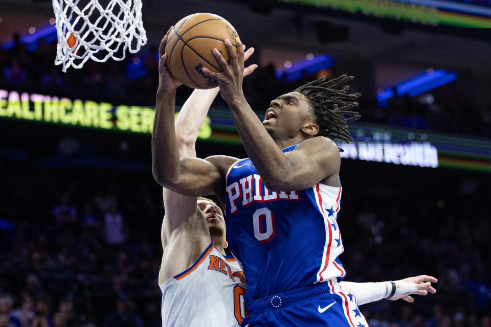 Philadelphia 76ers guard Tyrese Maxey (0) drives for a shot against New York Knicks guard Donte DiVincenzo (0) during the second half of Game 6 of the first round for the 2024 NBA playoffs.