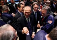 David Calhoun is congratulated after his company's IPO opened on the floor of the New York Stock Exchange