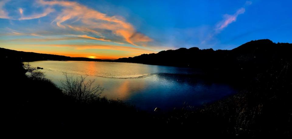 Believe it or not, this picture wasn't taken in the summer time! Eugene Howell sent us this shot of a December sunset at Salmon Cove Pond.