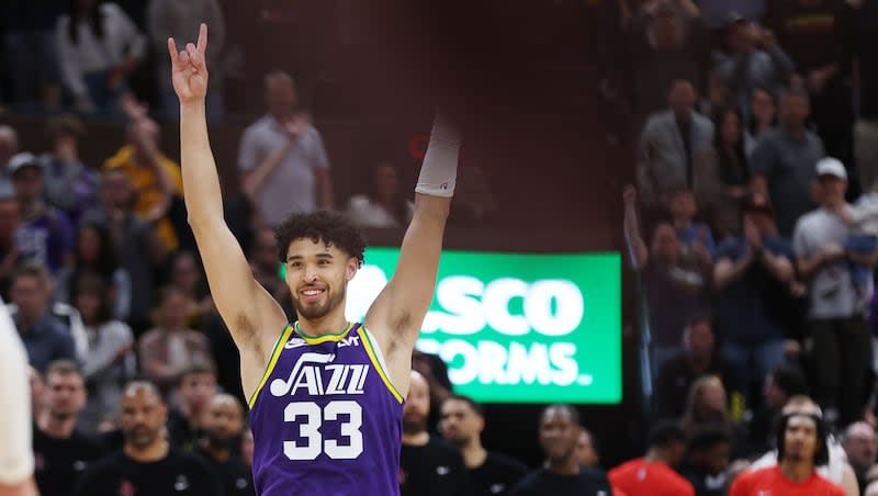 Utah Jazz guard Johnny Juzang (33) celebrates the Jazz win in Salt Lake City on Thursday, April 11, 2024. Utah won 124-121.