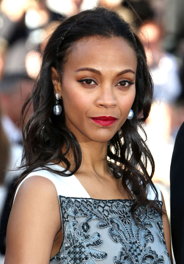 Cannes Film Festival 2013: Zoe Saldana worked the <a href="http://uk.lifestyle.yahoo.com/photos/celebrities-red-lipstick-beauty-make-up-inspiration-slideshow/" data-ylk="slk:red lips trend;elm:context_link;itc:0;sec:content-canvas;outcm:mb_qualified_link;_E:mb_qualified_link;ct:story;" class="link  yahoo-link">red lips trend</a>.
