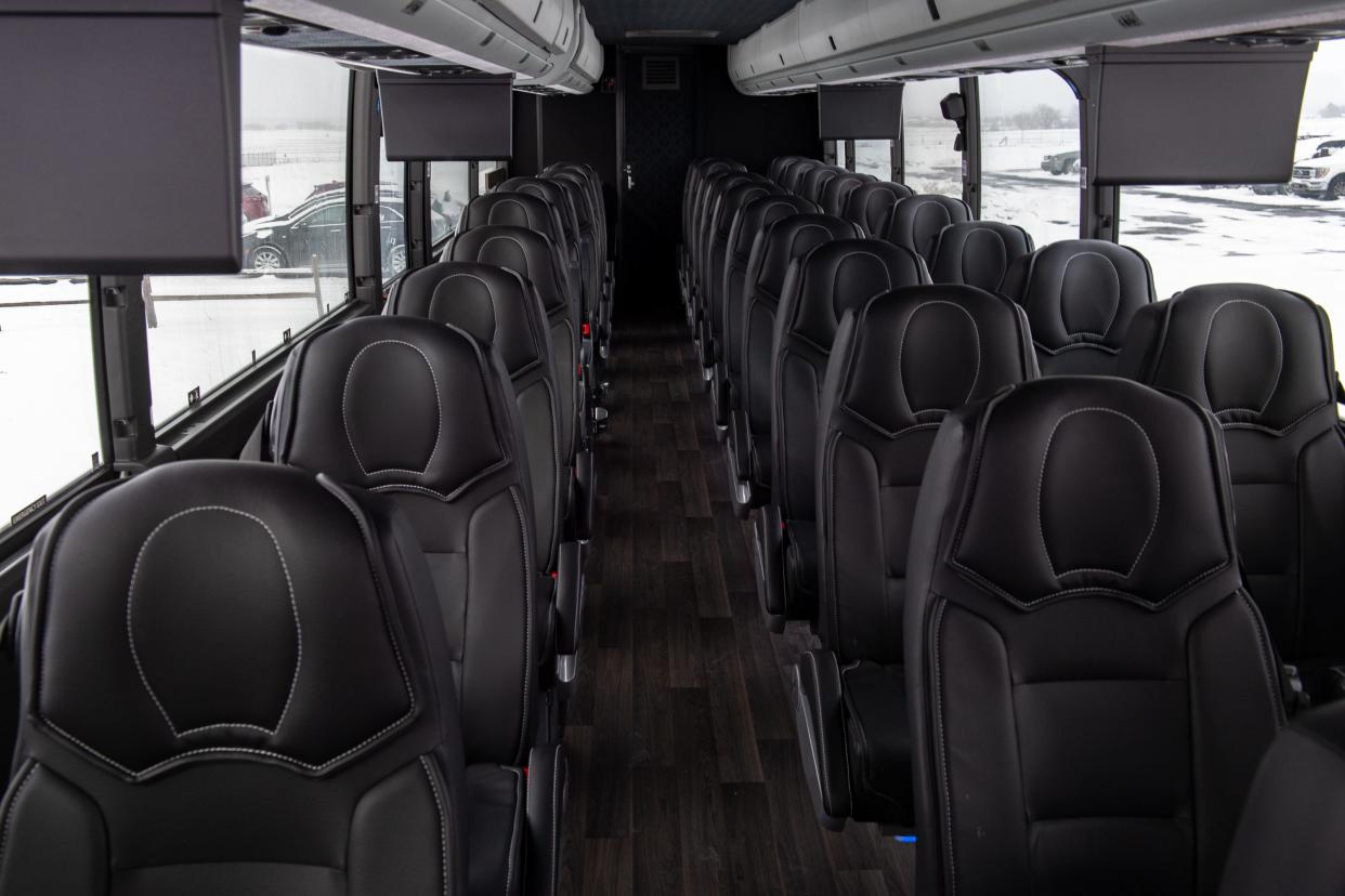 Black leather seats fill a Landline bus at the Northern Colorado Regional Airport on Jan. 30, 2023, in Loveland.