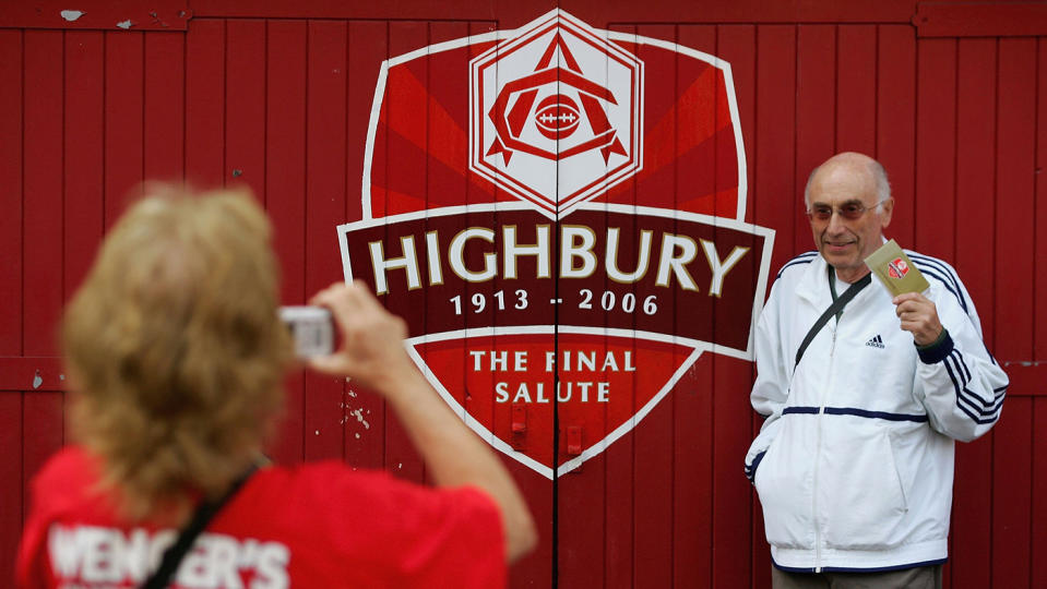 A fan poses at the last match played at Highbury before Arsenal moved to nearby Emirates Stadium (Getty Images)