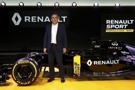 Renault Chief Executive Carlos Ghosn poses during the official presentation of the new Renault RS16 Formula One racing car at the company's research center, the Technocentre, in Guyancourt, near Paris, France, February 3, 2016. REUTERS/Benoit Tessier