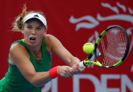 Tennis - Hong Kong Open final - Caroline Wozniacki of Denmark v Kristina Mladenovic of France - Hong Kong, China - 16/10/16. Wozniacki returns a shot. REUTERS/Bobby Yip