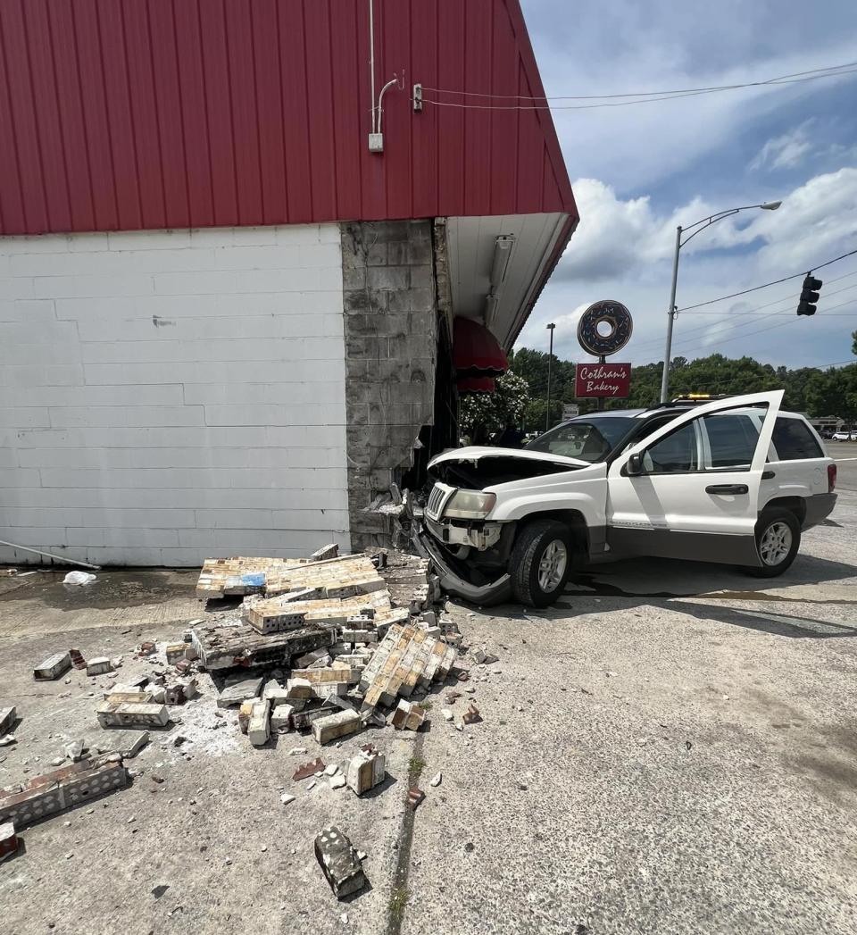 A vehicle rammed into the Cothran's Bakery building at 440 George Wallace Drive about lunchtime on June 18. Owner Chris Cothran said the popular bakery would reopen "with a full product line" at 7:30 a.m. on June 20.