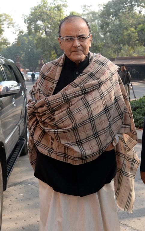 Indian Finance Minister Arun Jaitley, pictured as he arrives at the in Parliament in New Delhi, on November 27, 2014