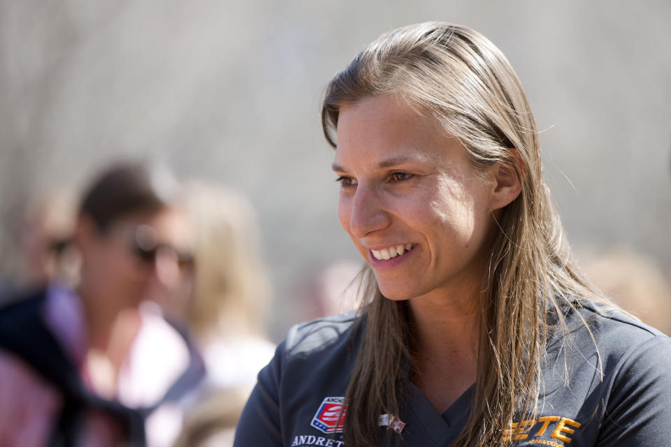 FILE - In this Tuesday, April 2, 2015, file photo, auto racing driver Simona de Silvestro speaks with students during a news conference at the The Franklin Institute in Philadelphia. Beth Paretta and Simona de Silvestro will be teaming up to put another woman on the Indianapolis 500 starting grid this May. On Tuesday, Jan. 19, 2021, Paretta Autosport and IndyCar officials announced they would work together to put a predominantly women-run team in the series' biggest race as part of an outreach to create more diversity in motorsports. (AP Photo/Matt Rourke, File)