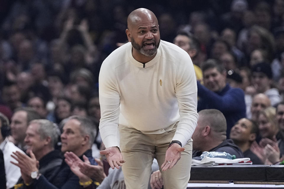 Cleveland Cavaliers head coach J.B. Bickerstaff gestures during the first half of the team's NBA basketball game against the Milwaukee Bucks, Wednesday, Jan. 17, 2024, in Cleveland. (AP Photo/Sue Ogrocki)