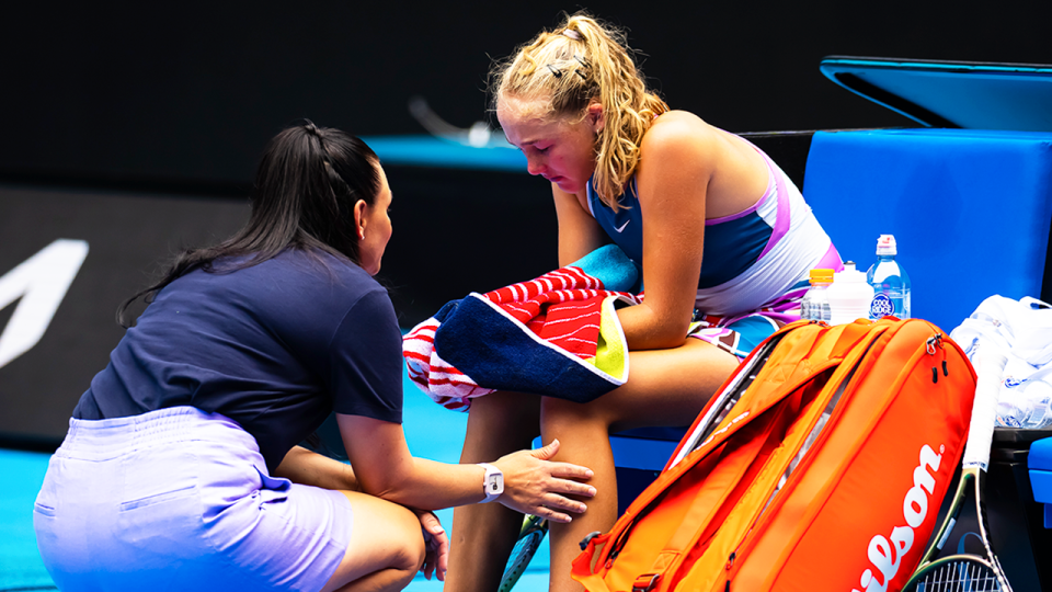 Casey Dellacqua (pictured left) consoling finalist Mirra Andreeva (pictured right) at the Australian Open.