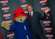 British actor Hugh Bonneville poses with a Paddington bear as he arrives for the screening of 'Paddington' at the British embassy during the 64th annual Berlin Film Festival, in Berlin, Germany, 07 February 2014. The movie premieres in German cinemas on 04 December 2014. Photo: PAUL ZINKEN/dpa | usage worldwide (Photo by Paul Zinken/picture alliance via Getty Images)