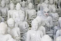 The Wider Image: From statues to toothpaste, the Myanmar village 'blessed' with marble bounty