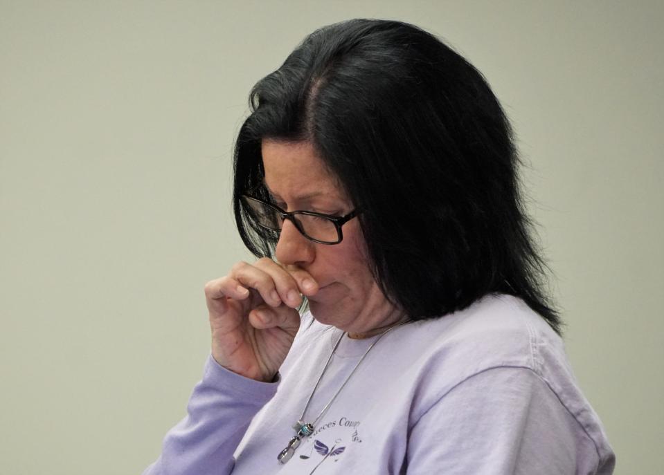 Fallon Wood is overcome with emotion on March 13, 2019 as she describes to Nueces County commissioners how she has dealt with the legal system following the murder of her daughter, Breanna Wood, in 2017.