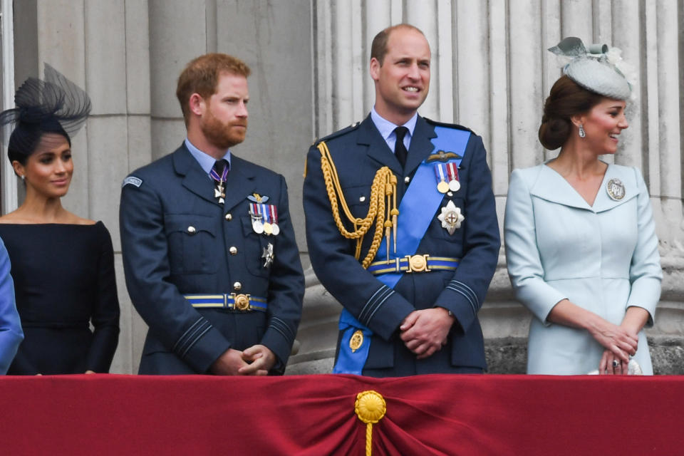 Meghan Markle Prince Harry Prince William and Kate Middleton stand on the Buckingham Palace balcony