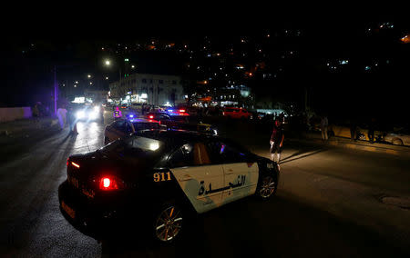 Jordanian police cars are seen one day after the security incident at the city of Al Salt, Jordan, August 11, 2018. REUTERS/Muhammad Hamed