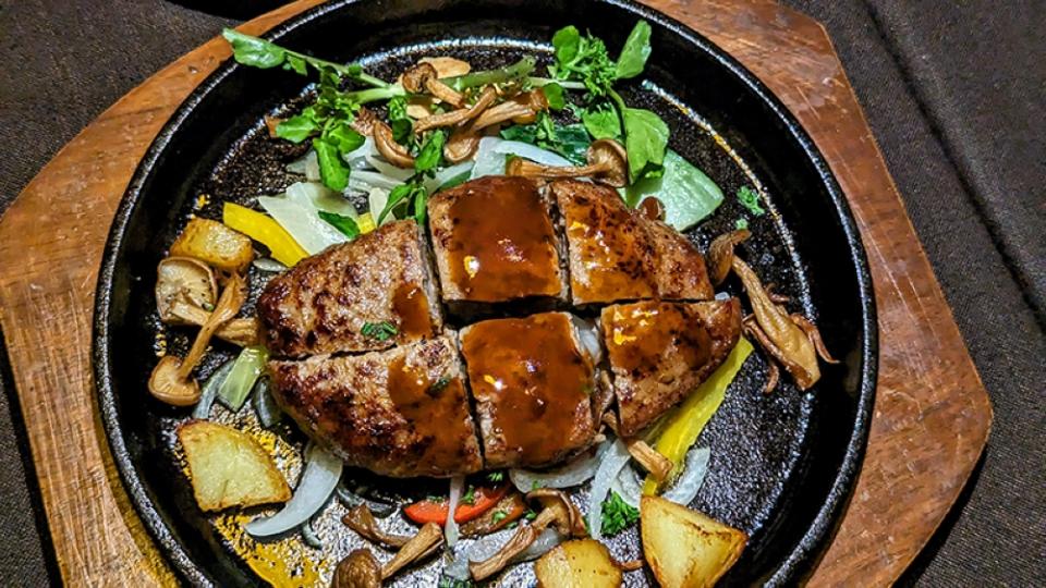 The Tepan Hamburger Steak, topped with a spoonful of demi-glace.