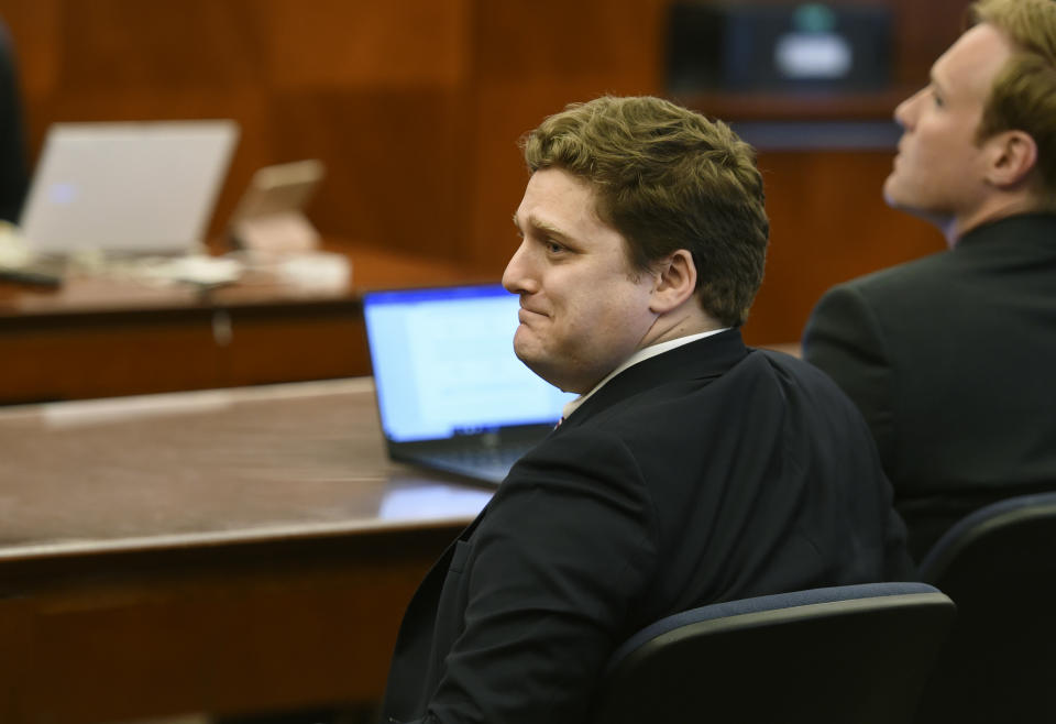 Dewayne Johnson's attorney Brent Wisner reacts as the verdict is read in Johnson's case against Monsanto at the Superior Court of California in San Francisco on Friday, Aug. 10, 2018. A San Francisco jury on Friday ordered agribusiness giant Monsanto to pay $289 million to the former school groundskeeper dying of cancer, saying the company's popular Roundup weed killer contributed to his disease. (Josh Edelson/Pool Photo via AP)