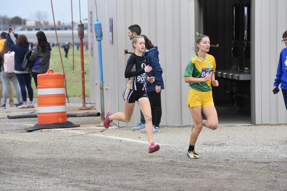 Onsted's Emmry Ross runs during the 2023 MHSAA state championship races at Michigan International Speedway.