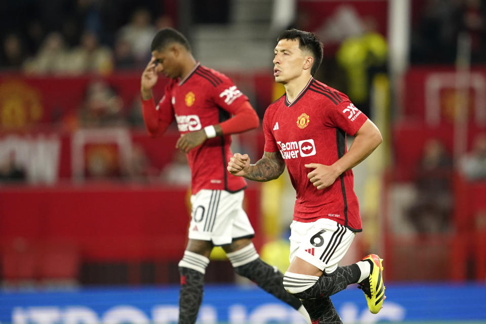 Manchester United's Anthony Martial, right, and Manchester United's Diogo Dalot during the English Premier League soccer match between Manchester United and Newcastle United, in Manchester, England, Wednesday, May 15, 2024. (AP Photo/Dave Thompson)