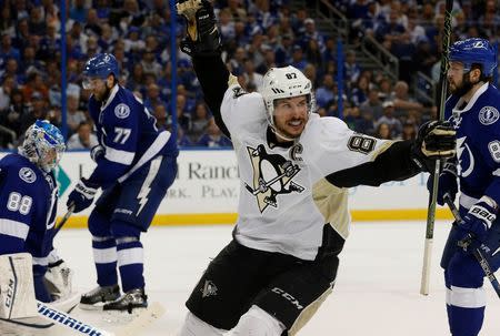 May 24, 2016; Tampa, FL, USA; Pittsburgh Penguins center Sidney Crosby (87) reacts as he scores a goal against the Tampa Bay Lightning during the second period of game six of the Eastern Conference Final of the 2016 Stanley Cup Playoffs at Amalie Arena. Mandatory Credit: Kim Klement-USA TODAY Sports