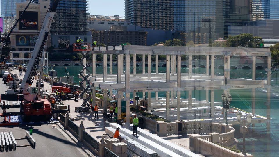 Workers at a Formula One construction site by the Bellagio fountains on September 25, 2023, in Las Vegas. - Bizuayehu Tesfaye/Las Vegas Review-Journal/AP