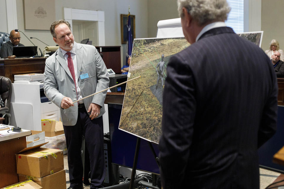 Mike Sutton, forensic engineer with the North Carolina-based Accident Research Specialists, answers questions from defense attorney Dick Harpootlian during the Alex Murdaugh trial at the Colleton County Courthouse in Walterboro, S.C., on Tuesday, Feb. 21, 2023. The 54-year-old attorney is standing trial on two counts of murder in the shootings of his wife and son at their Colleton County, S.C., home and hunting lodge on June 7, 2021. (Grace Beahm Alford/The Post And Courier via AP, Pool)