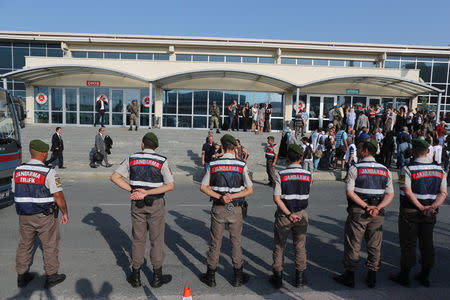 Turkish soldiers stand guard outside the Silivri Prison and Courthouse complex during trial of 17 writers, executives and lawyers of the secularist Cumhuriyet newspaper in Silivri near Istanbul, Turkey, September 11, 2017. REUTERS/Osman Orsal