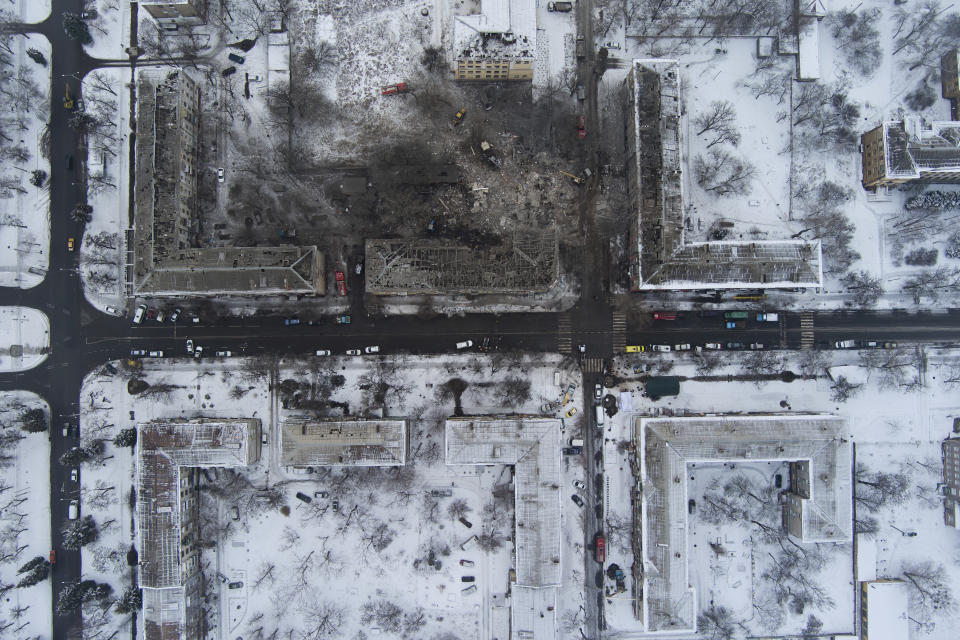 An aerial view of an apartment building hit by a Russian rocket in Kramatorsk, Ukraine, Thursday, Feb. 2, 2023. (AP Photo/Yevgen Honcharenko)