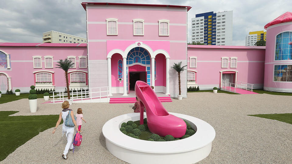 BERLIN, GERMANY - MAY 16:  Visitors arrive at the Barbie Dreamhouse Experience on May 16, 2013 in Berlin, Germany. The Barbie Dreamhouse is a life-sized house full of Barbie fashion, furniture and accessories and will be open to the public until August 25 before it moves on to other cities in Europe.  (Photo by Sean Gallup/Getty Images)
