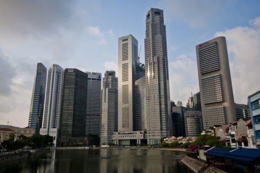 A picture shows the skyline of Singapore's financial district across the Singapore River in August 2011. (AFP photo)